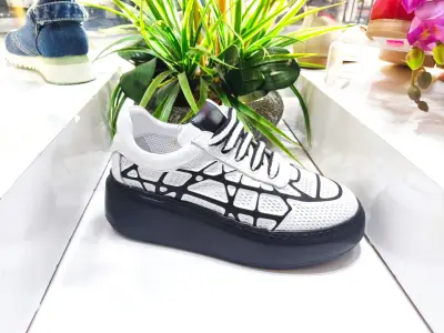 LEATHER AND DENIM SHOE SHOP