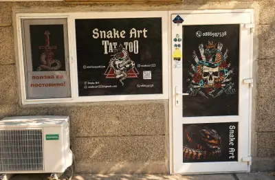 Snake Art Tattoo Studio