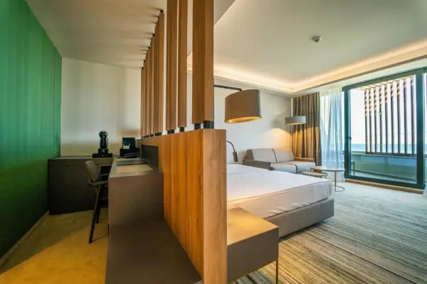 Double Room with Partial Sea View (2 Adults + 2 Children) - Free Parking & Beach Access