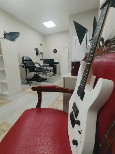 Rock Needle Tattoo