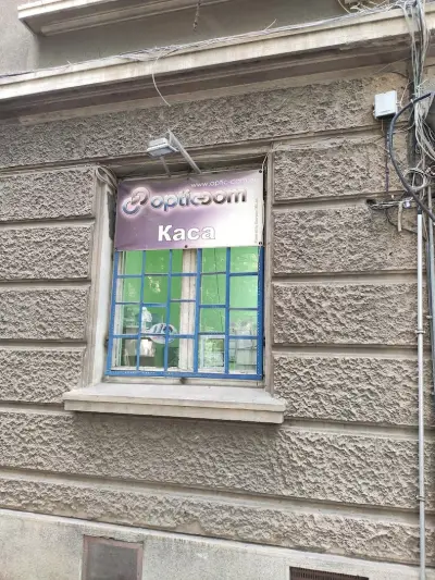 Optic-Com каса & Принт център