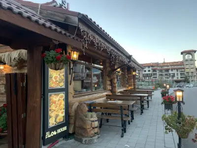 Дървената къща(The Log House)